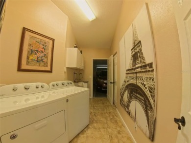 Stunning home, beautiful open floor plan, located in the quiet on Ocala Palms Golf and Country Club in Florida - for sale on GolfHomes.com, golf home, golf lot