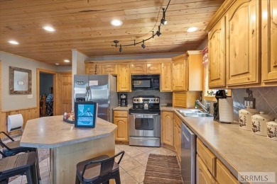 Prime Location & Turnkey Investment Opportunity. Nestled in the on Island Park Village Resort Golf Course in Idaho - for sale on GolfHomes.com, golf home, golf lot