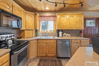 Prime Location & Turnkey Investment Opportunity. Nestled in the on Island Park Village Resort Golf Course in Idaho - for sale on GolfHomes.com, golf home, golf lot