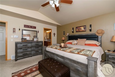 Beautifully maintained 5-bedroom, 3-bath home backing to Lake on Lake Hills Golf Course in Montana - for sale on GolfHomes.com, golf home, golf lot