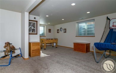 Beautifully maintained 5-bedroom, 3-bath home backing to Lake on Lake Hills Golf Course in Montana - for sale on GolfHomes.com, golf home, golf lot