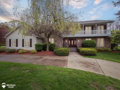 Set on nearly half an acre in Grand Blanc's sought-after Warwick on Warwick Hills Golf and Country Club in Michigan - for sale on GolfHomes.com, golf home, golf lot