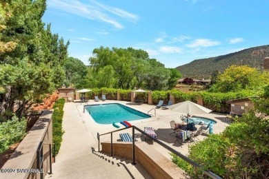 This 2 bed, 2 bath single level townhouse with a  carport is on Canyon Mesa Country Club in Arizona - for sale on GolfHomes.com, golf home, golf lot