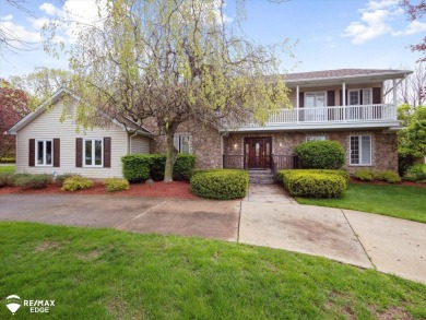 Set on nearly half an acre in Grand Blanc's sought-after Warwick on Warwick Hills Golf and Country Club in Michigan - for sale on GolfHomes.com, golf home, golf lot