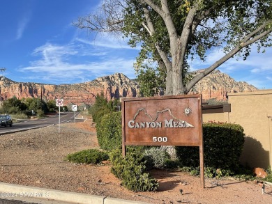 This 2 bed, 2 bath single level townhouse with a  carport is on Canyon Mesa Country Club in Arizona - for sale on GolfHomes.com, golf home, golf lot