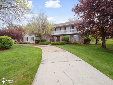 Set on nearly half an acre in Grand Blanc's sought-after Warwick on Warwick Hills Golf and Country Club in Michigan - for sale on GolfHomes.com, golf home, golf lot