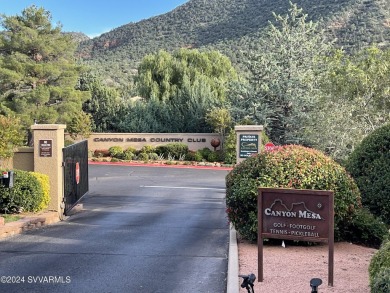 This 2 bed, 2 bath single level townhouse with a  carport is on Canyon Mesa Country Club in Arizona - for sale on GolfHomes.com, golf home, golf lot