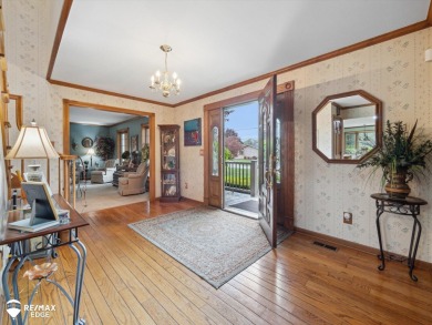 Set on nearly half an acre in Grand Blanc's sought-after Warwick on Warwick Hills Golf and Country Club in Michigan - for sale on GolfHomes.com, golf home, golf lot