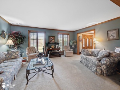 Set on nearly half an acre in Grand Blanc's sought-after Warwick on Warwick Hills Golf and Country Club in Michigan - for sale on GolfHomes.com, golf home, golf lot