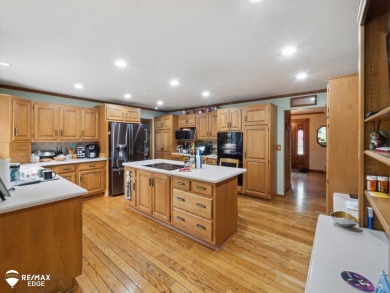 Set on nearly half an acre in Grand Blanc's sought-after Warwick on Warwick Hills Golf and Country Club in Michigan - for sale on GolfHomes.com, golf home, golf lot