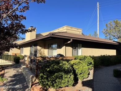 This 2 bed, 2 bath single level townhouse with a  carport is on Canyon Mesa Country Club in Arizona - for sale on GolfHomes.com, golf home, golf lot