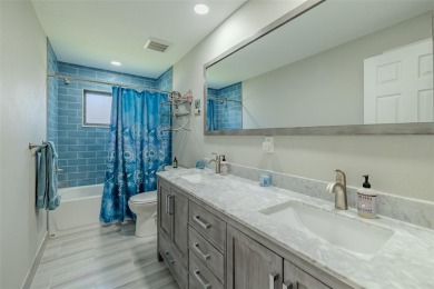 Under contract-accepting backup offers. Must-See Dunedin Pool on The Dunedin Country Club in Florida - for sale on GolfHomes.com, golf home, golf lot
