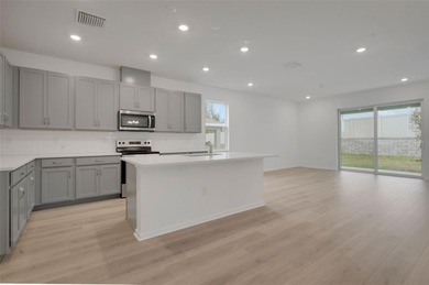 One or more photo(s) has been virtually staged. Poinciana on Fishermans Cove Golf and Marina in Florida - for sale on GolfHomes.com, golf home, golf lot