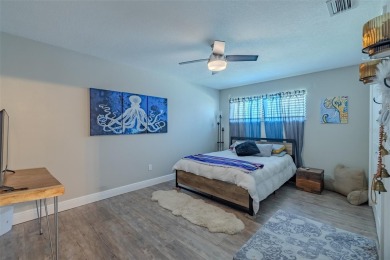 Under contract-accepting backup offers. Must-See Dunedin Pool on The Dunedin Country Club in Florida - for sale on GolfHomes.com, golf home, golf lot