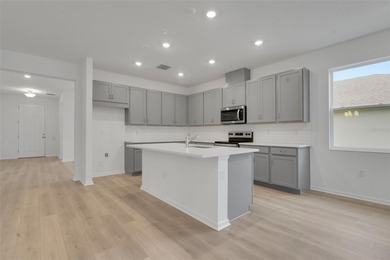 One or more photo(s) has been virtually staged. Poinciana on Fishermans Cove Golf and Marina in Florida - for sale on GolfHomes.com, golf home, golf lot