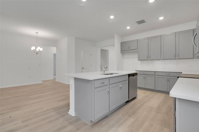 One or more photo(s) has been virtually staged. Poinciana on Fishermans Cove Golf and Marina in Florida - for sale on GolfHomes.com, golf home, golf lot