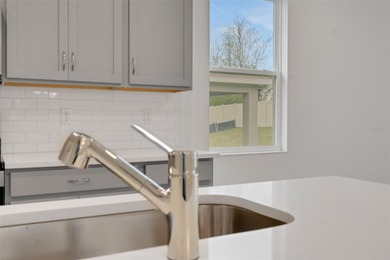 One or more photo(s) has been virtually staged. Poinciana on Fishermans Cove Golf and Marina in Florida - for sale on GolfHomes.com, golf home, golf lot