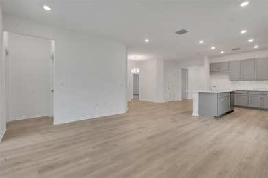 One or more photo(s) has been virtually staged. Poinciana on Fishermans Cove Golf and Marina in Florida - for sale on GolfHomes.com, golf home, golf lot