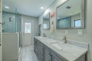 Under contract-accepting backup offers. Must-See Dunedin Pool on The Dunedin Country Club in Florida - for sale on GolfHomes.com, golf home, golf lot