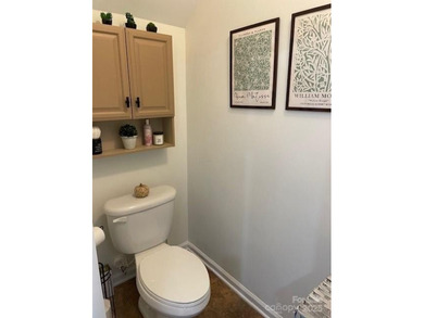 This beautifully renovated townhouse, offers modern living at on Tega Cay Golf Club in South Carolina - for sale on GolfHomes.com, golf home, golf lot