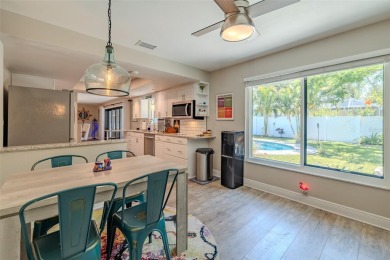 Under contract-accepting backup offers. Must-See Dunedin Pool on The Dunedin Country Club in Florida - for sale on GolfHomes.com, golf home, golf lot