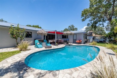 Under contract-accepting backup offers. Must-See Dunedin Pool on The Dunedin Country Club in Florida - for sale on GolfHomes.com, golf home, golf lot