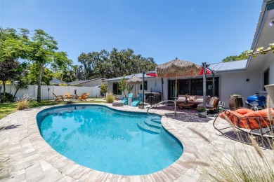 Under contract-accepting backup offers. Must-See Dunedin Pool on The Dunedin Country Club in Florida - for sale on GolfHomes.com, golf home, golf lot