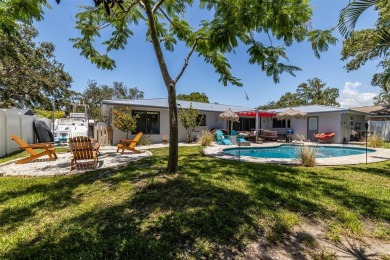 Under contract-accepting backup offers. Must-See Dunedin Pool on The Dunedin Country Club in Florida - for sale on GolfHomes.com, golf home, golf lot