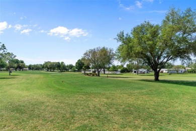 This stunning 3 bedroom 2 bath Palm Harbor home sits on the #11 on Brookridge Country Club in Florida - for sale on GolfHomes.com, golf home, golf lot