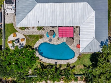 Under contract-accepting backup offers. Must-See Dunedin Pool on The Dunedin Country Club in Florida - for sale on GolfHomes.com, golf home, golf lot