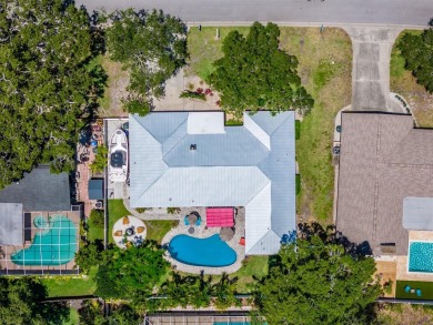 Under contract-accepting backup offers. Must-See Dunedin Pool on The Dunedin Country Club in Florida - for sale on GolfHomes.com, golf home, golf lot
