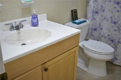 This large ground floor 2/2 is tastefully done and meticulously on Sunrise Lakes Phase IV Golf Course in Florida - for sale on GolfHomes.com, golf home, golf lot