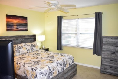 This large ground floor 2/2 is tastefully done and meticulously on Sunrise Lakes Phase IV Golf Course in Florida - for sale on GolfHomes.com, golf home, golf lot