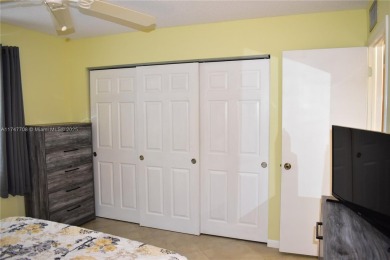 This large ground floor 2/2 is tastefully done and meticulously on Sunrise Lakes Phase IV Golf Course in Florida - for sale on GolfHomes.com, golf home, golf lot