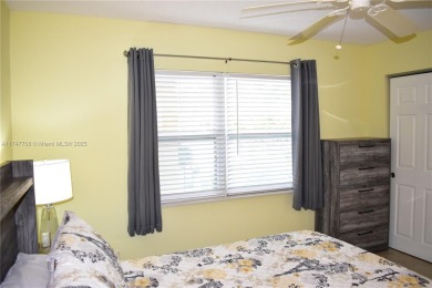 This large ground floor 2/2 is tastefully done and meticulously on Sunrise Lakes Phase IV Golf Course in Florida - for sale on GolfHomes.com, golf home, golf lot