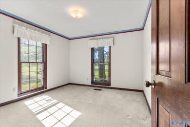 Discover golf course living at its finest with this stunning on Burningtree Country Club in Alabama - for sale on GolfHomes.com, golf home, golf lot