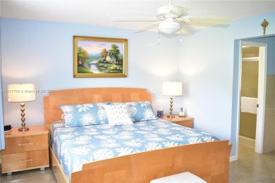 This large ground floor 2/2 is tastefully done and meticulously on Sunrise Lakes Phase IV Golf Course in Florida - for sale on GolfHomes.com, golf home, golf lot