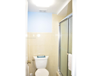 This large ground floor 2/2 is tastefully done and meticulously on Sunrise Lakes Phase IV Golf Course in Florida - for sale on GolfHomes.com, golf home, golf lot