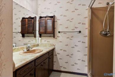 Discover golf course living at its finest with this stunning on Burningtree Country Club in Alabama - for sale on GolfHomes.com, golf home, golf lot