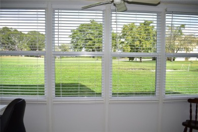 This large ground floor 2/2 is tastefully done and meticulously on Sunrise Lakes Phase IV Golf Course in Florida - for sale on GolfHomes.com, golf home, golf lot