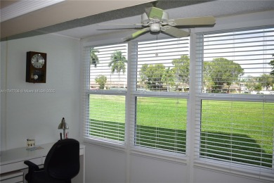 This large ground floor 2/2 is tastefully done and meticulously on Sunrise Lakes Phase IV Golf Course in Florida - for sale on GolfHomes.com, golf home, golf lot