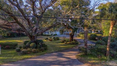 Waterfront Home in Star Lake - Endless Potential  Located in the on Pensacola Country Club in Florida - for sale on GolfHomes.com, golf home, golf lot