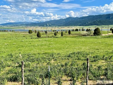 Overlooking beautiful Alexander Resevoir this 5.40 acre lot has on Oregon Trail Country Club in Idaho - for sale on GolfHomes.com, golf home, golf lot
