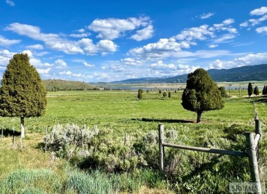 Overlooking beautiful Alexander Resevoir this 5.40 acre lot has on Oregon Trail Country Club in Idaho - for sale on GolfHomes.com, golf home, golf lot