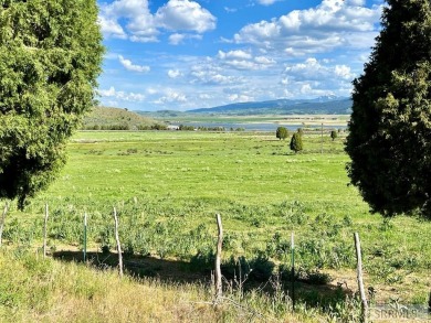 Overlooking beautiful Alexander Resevoir this 5.40 acre lot has on Oregon Trail Country Club in Idaho - for sale on GolfHomes.com, golf home, golf lot