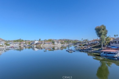 Welcome home to your stunning waterfront retreat, a single-level on Canyon Lake Country Club in California - for sale on GolfHomes.com, golf home, golf lot