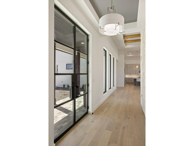 Welcome to 105 Barefoot - an exceptional Hill Country modern on Ram Rock Golf Course in Texas - for sale on GolfHomes.com, golf home, golf lot