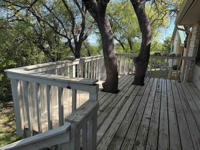 Are you looking for the perfect fixer-upper? This is the one! on Slick Rock Golf Course - Horseshoe Bay in Texas - for sale on GolfHomes.com, golf home, golf lot
