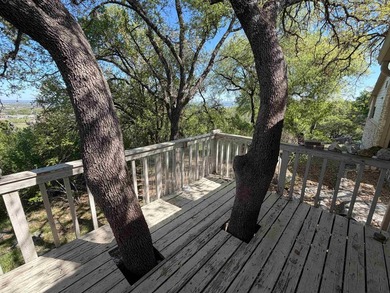 Are you looking for the perfect fixer-upper? This is the one! on Slick Rock Golf Course - Horseshoe Bay in Texas - for sale on GolfHomes.com, golf home, golf lot
