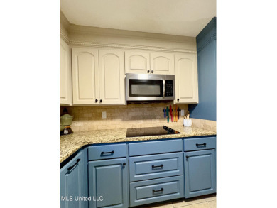 Beautifully updated 4 bedroom home is walking distance to the on Castlewoods Golf Club in Mississippi - for sale on GolfHomes.com, golf home, golf lot